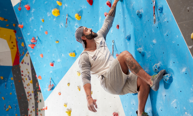 Man on a climbing wall