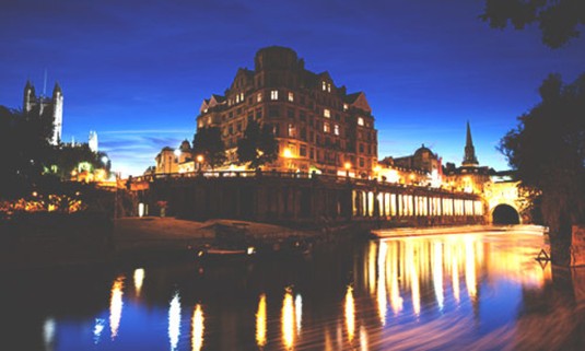Bath at night with river running through it