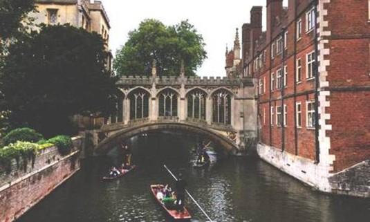 A Cambridge Stag Party punting through the city.