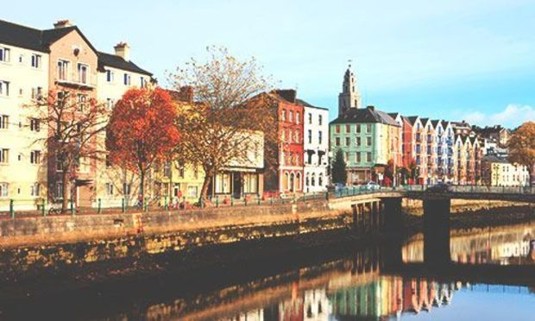 Autumn view of the city from the River Lee. Explore Cork Stag Party ideas below: