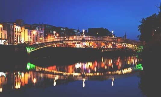 Purple sky over the Ha'penny Bridge. Explore Dublin Stag Party ideas below: