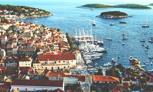 View over old town and the marina towards the Pakleni Islands. Discover Hvar Stag Party ideas below: