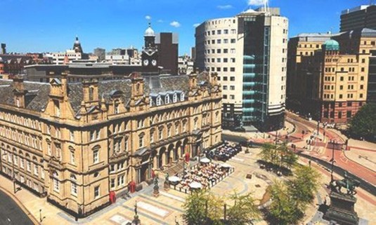 Looking down on Leeds' City Square. Discover Leeds Stag Party ideas below:
