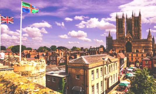 Summer day looking out from Lincoln Castle. Find out more about our Lincoln stag party activities:
