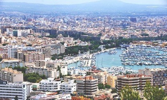Aerial picture of the city and the Palma de Mallorca Marina on a sunny day. Discover Palma Stag Party ideas below: