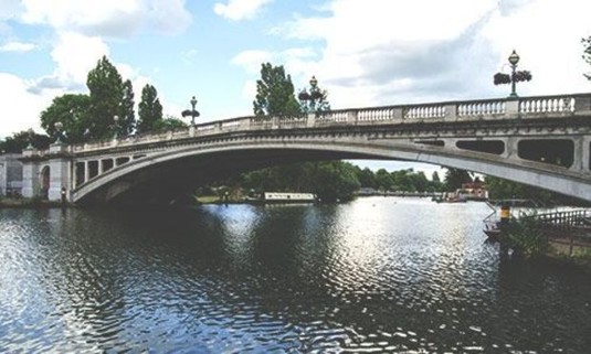 View of Reading Bridge from the water. Discover Reading Stag Party ideas below: