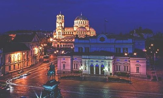 Nighttime landscape photo of the St. Alexander Nevski Memorial Temple lit up. Explore Sofia Stag Party ideas below: