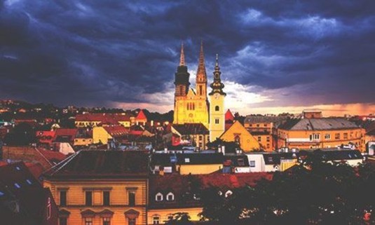Nighttime skyline with the Zagreb Cathedral lit up. Explore Zagreb Stag Party ideas below: