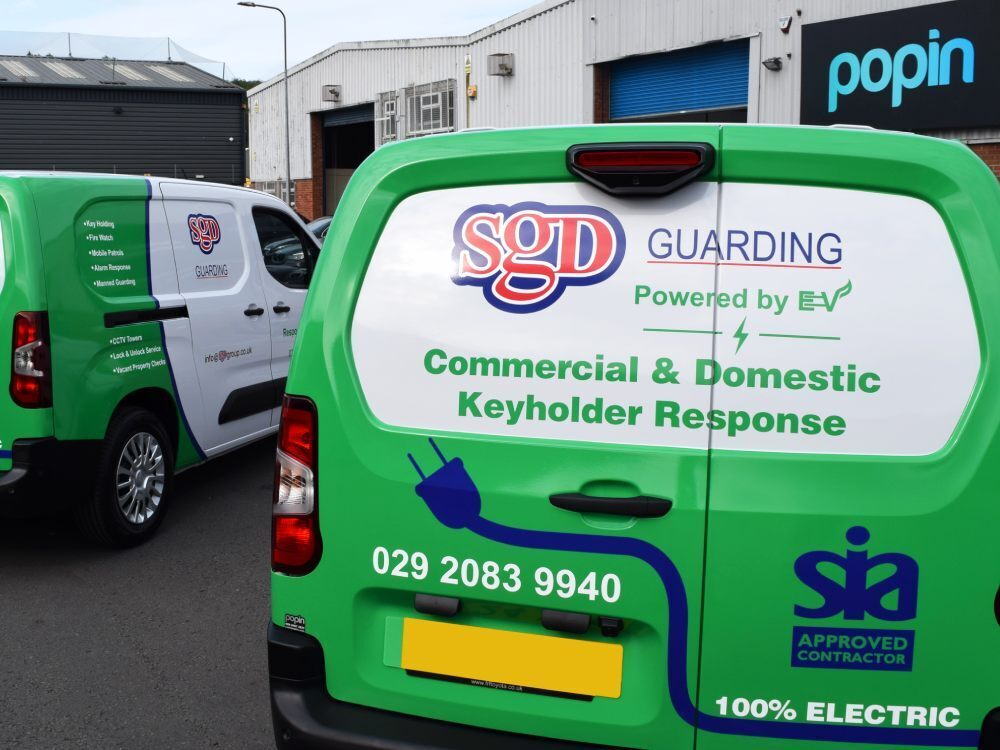 Company van wrap on rear of Toyota Proace electric vehicle.