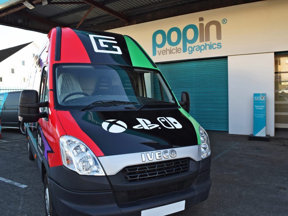 Gaming Squad company branded vehicle wrap on front end of Iveco Daily van outside Popin in Cardiff.