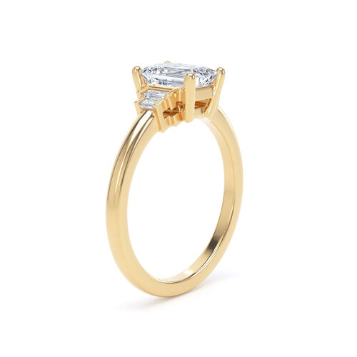 Emerald and baguette diamond ring