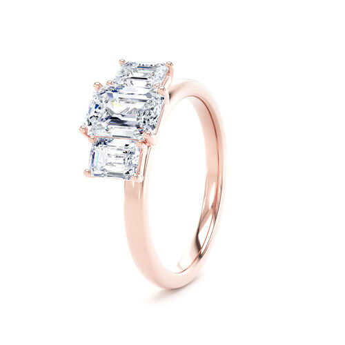 Emerald cut diamond trilogy ring
