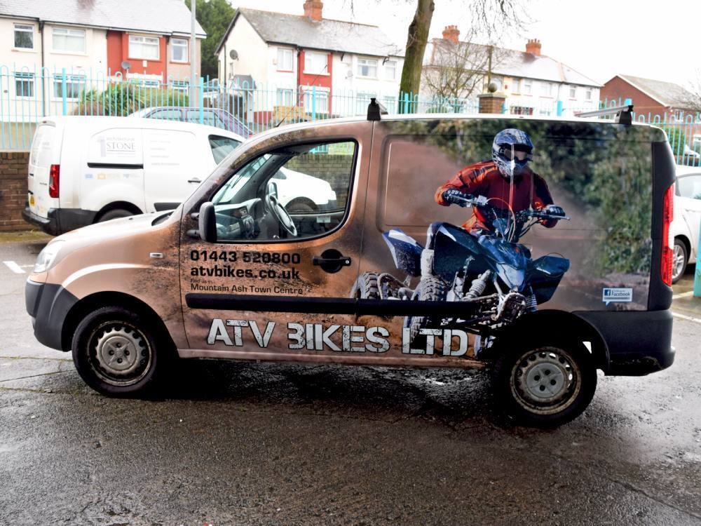 Full vehicle livery on a Fiat Doblo Cargo company van.