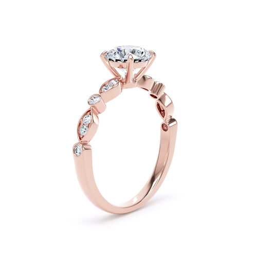 Round brilliant solitaire with fancy shaped shoulders