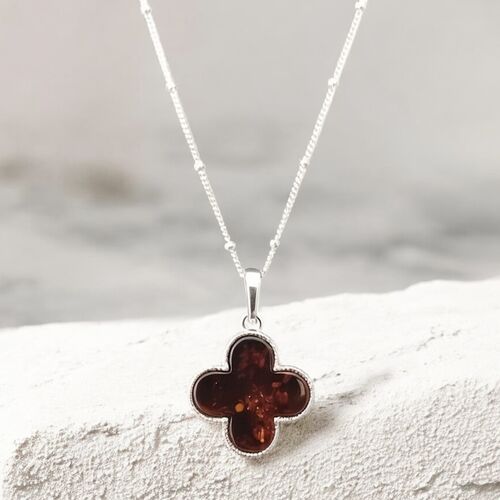 Amber quatrefoil pendant in sterling silver