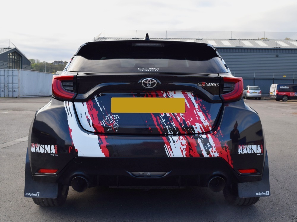 Rear of Toyota Yaris GR sports car with motorsport livery and race graphics