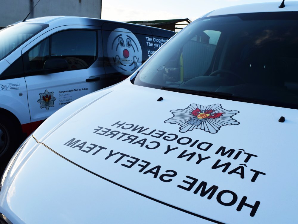 South Wales Fire and Rescue Services vehicle graphics on front end of Ford Transit Connect vans.