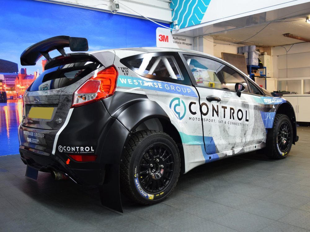 Car wrap and graphics on Ford Fiesta R5 company car.