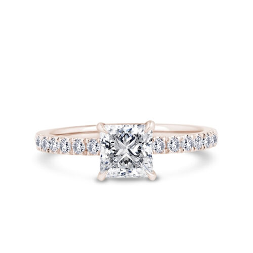 Princess cut solitaire with diamond shoulders and hidden halo