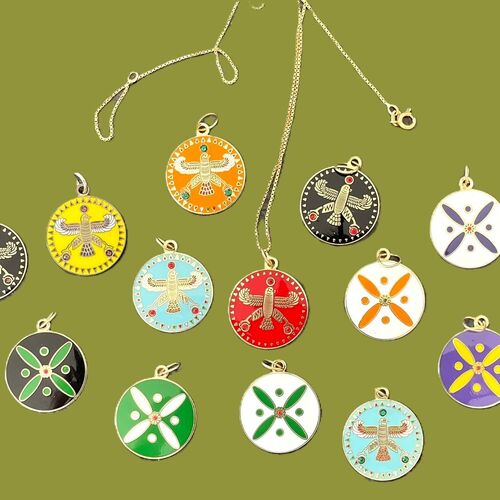 Round Pendant. The Persian Falcon. Deep Orange with 3 Green Stones.