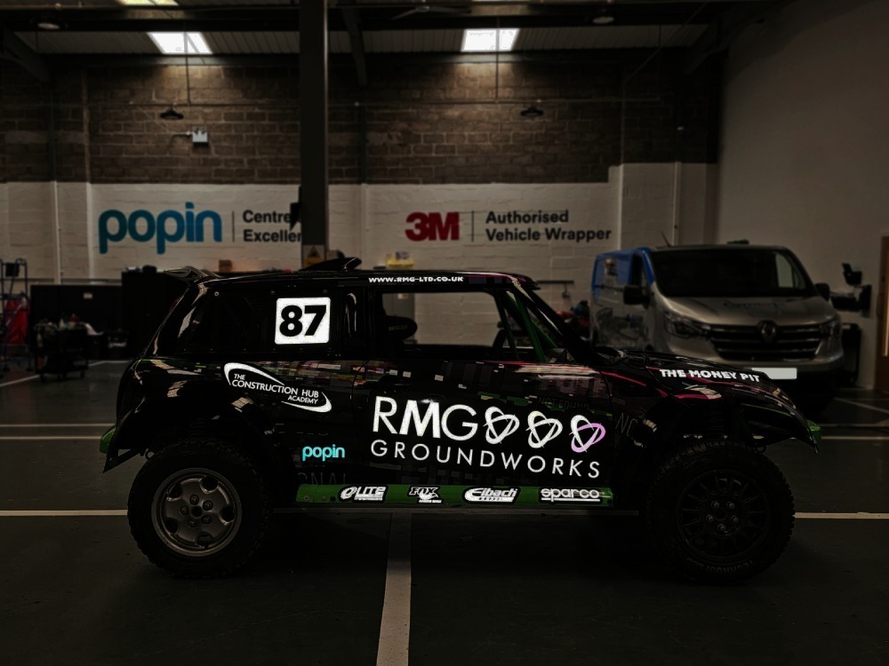 Reflective graphics on a race rally car.