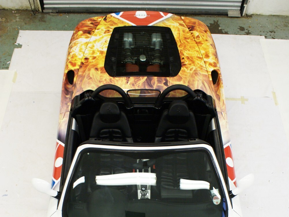 Domino's Pizza car wrap with flames design on the rear of a Ferrari 360 Spider.
