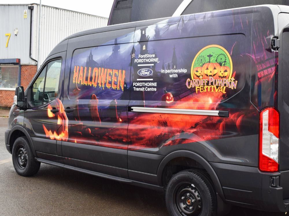 Halloween themed partial vehicle wrap on a Ford E-Transit van for Fordthorne.
