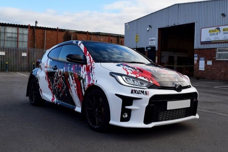 Motorsport wrap and graphics on a Toyota Yaris GR sports car.