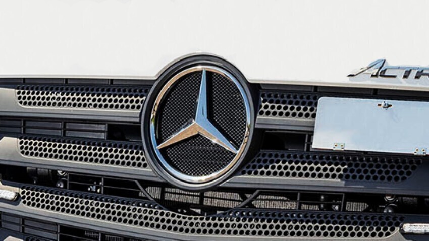 Mercedes emblem on a white lorry.