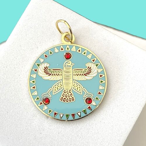 Round Pendant. The Persian Falcon.  Blue Turquoise with 3 Red Stones.