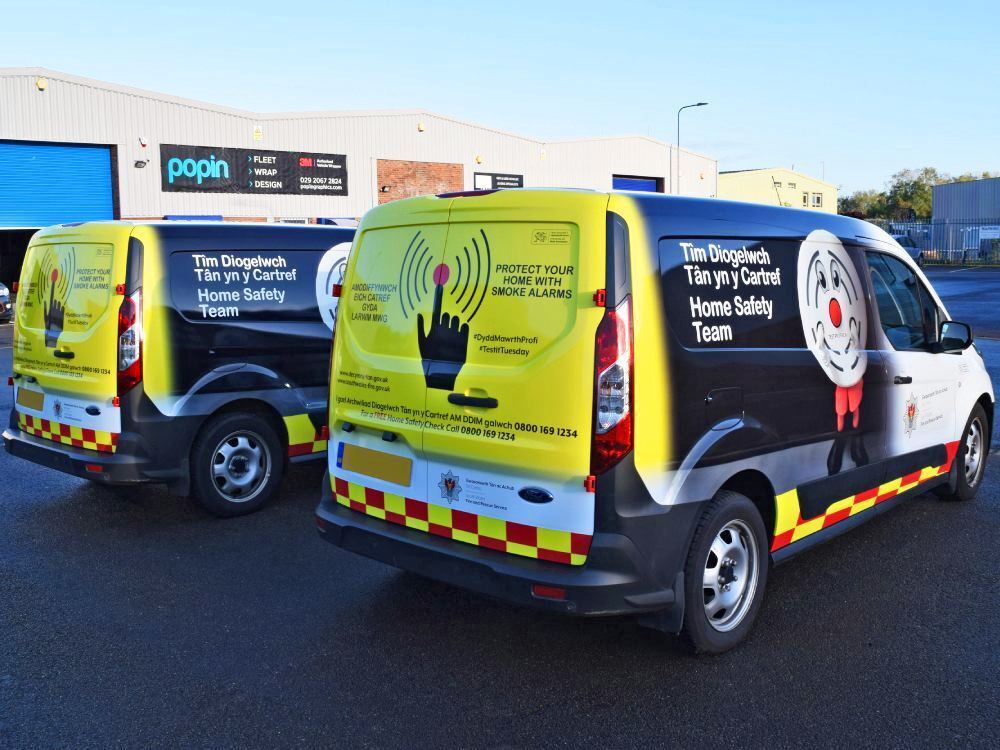 Full wrap and chevron graphics on two Ford Transit Connect vans for South Wales Fire and Rescue Services.