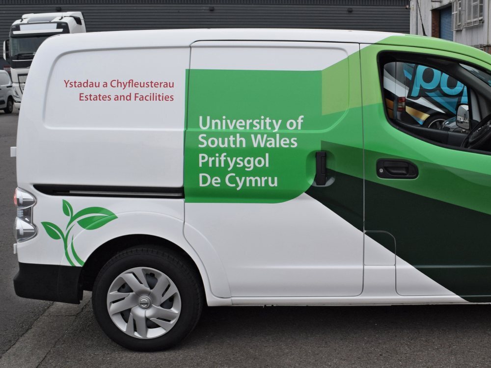 Branded van wrap on Nissan enV200 for University of South Wales.