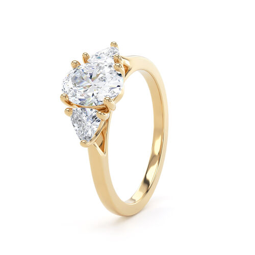 Oval and trilliant cut trilogy ring