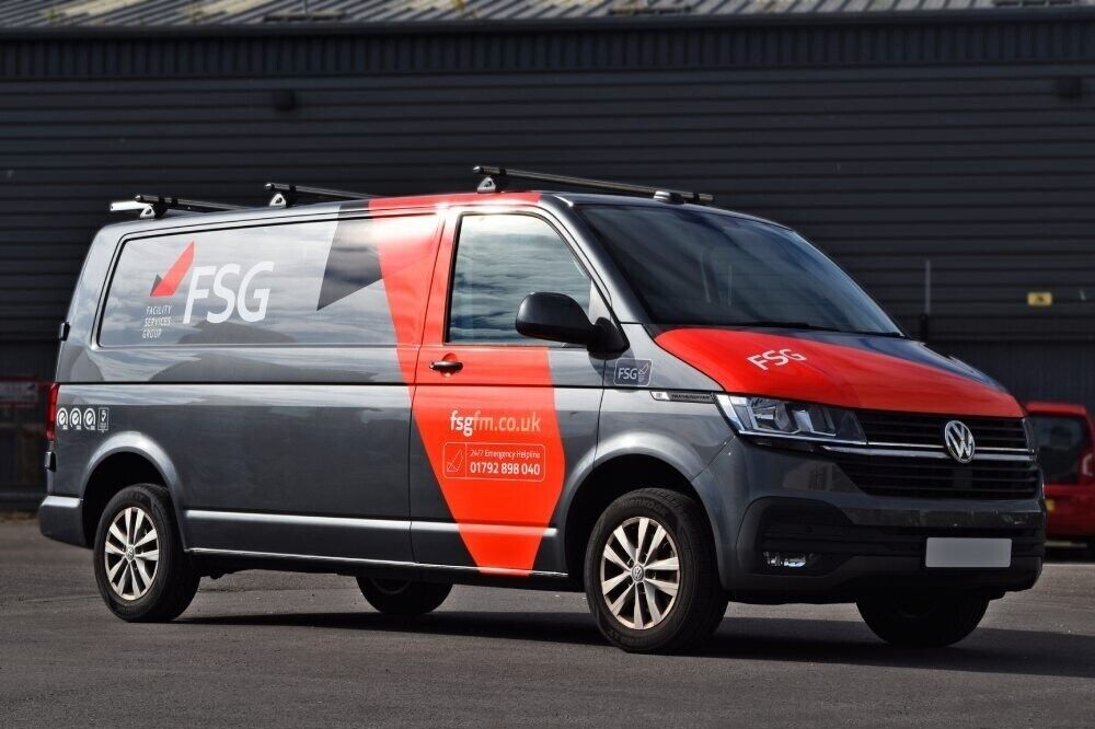 Volkswagen Transporter van with company branded vehicle wrap and vinyl graphics.