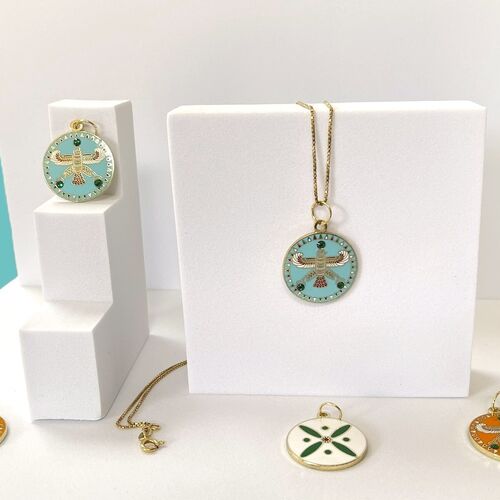 Round Pendant. The Persian Falcon.  Blue Turquoise with 3 Green Stones.