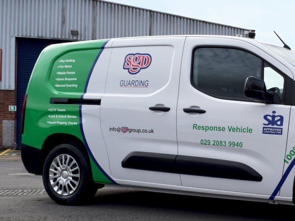 Van wrap and graphics on side of Toyota Proace electric vehicle.