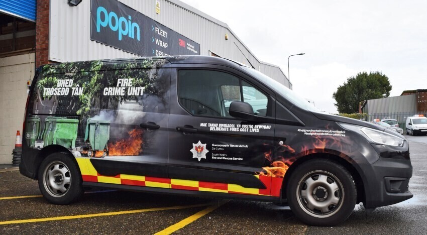 Branded vehicle wrap and graphics on a Ford Transit van outside Popin in Cardiff.