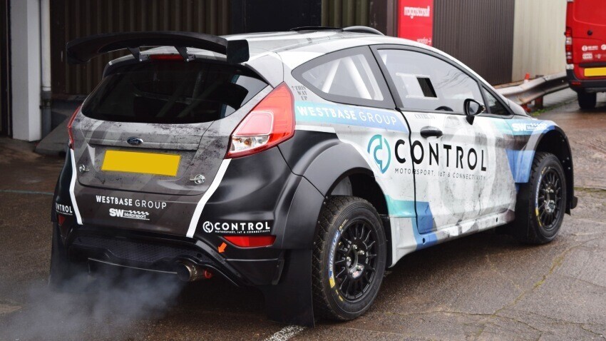 Ford Fiesta R5 company car with commercial business wrap and vinyl graphics.