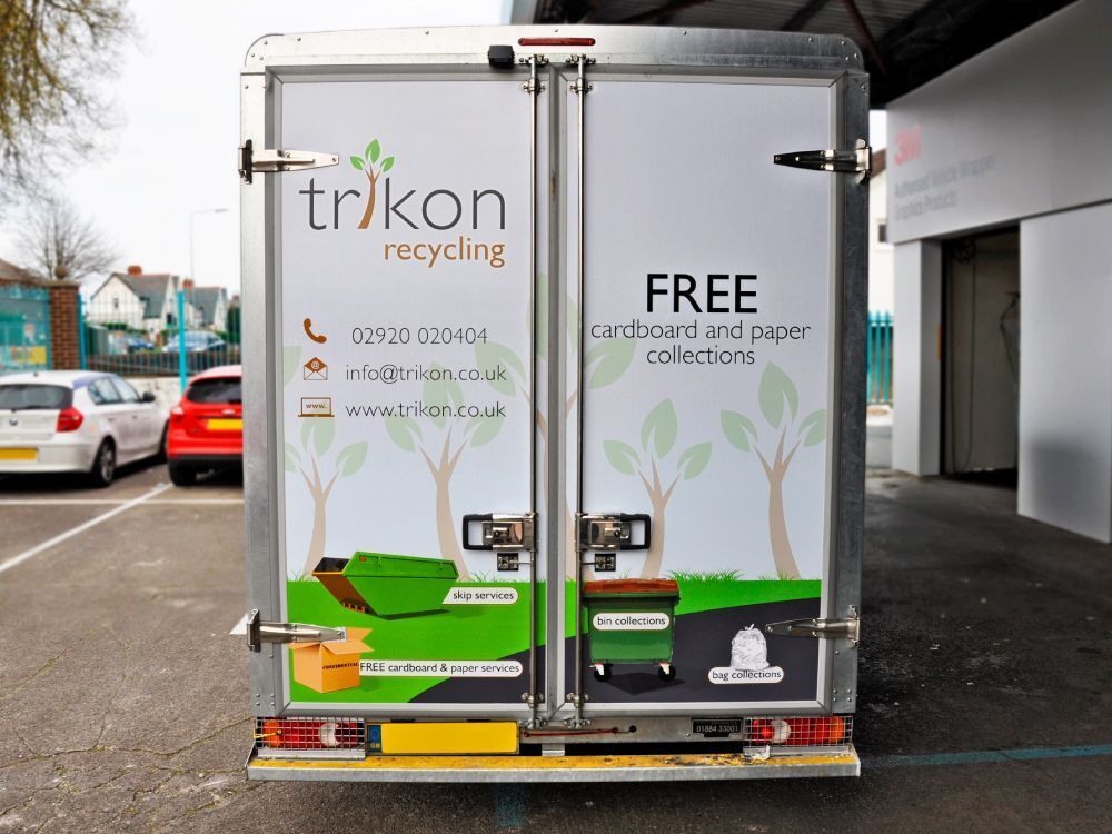 Van wrap on rear of a company Renault Master.