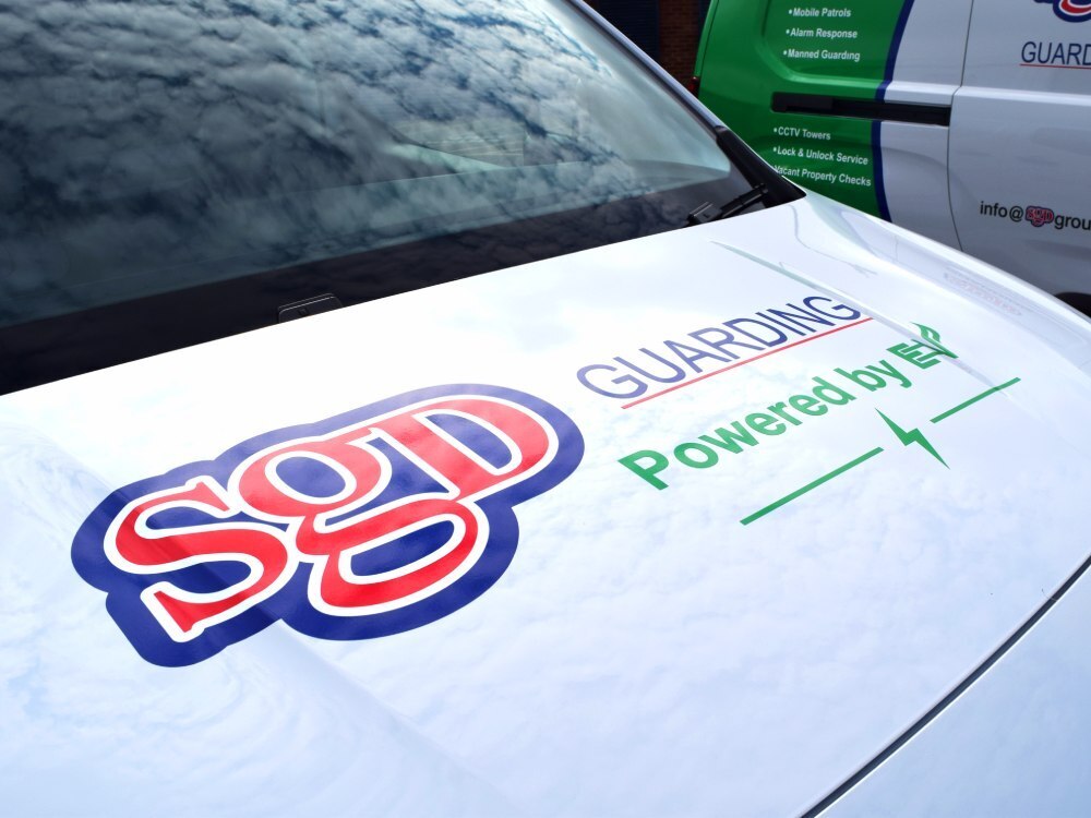 Vinyl graphics on bonnet of white company Toyota Proace van.