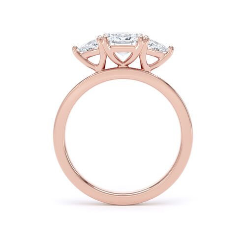 Cushion and trilliant cut trilogy ring