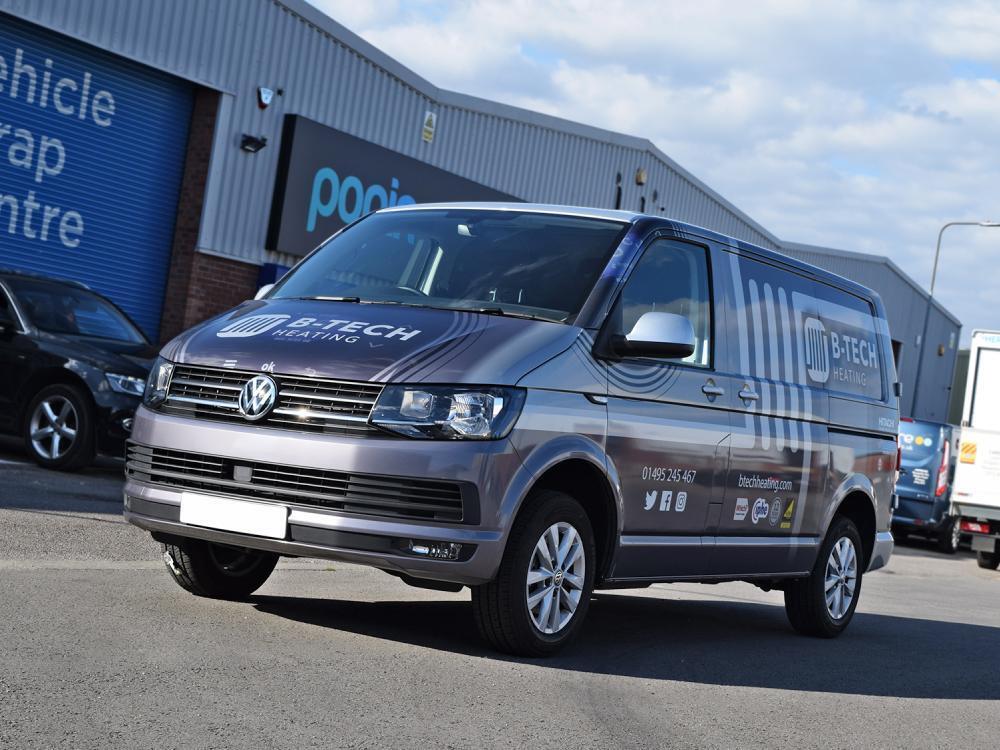 Shiny silver van wrap on company Volkswagen Transporter outside Popin in Cardiff.