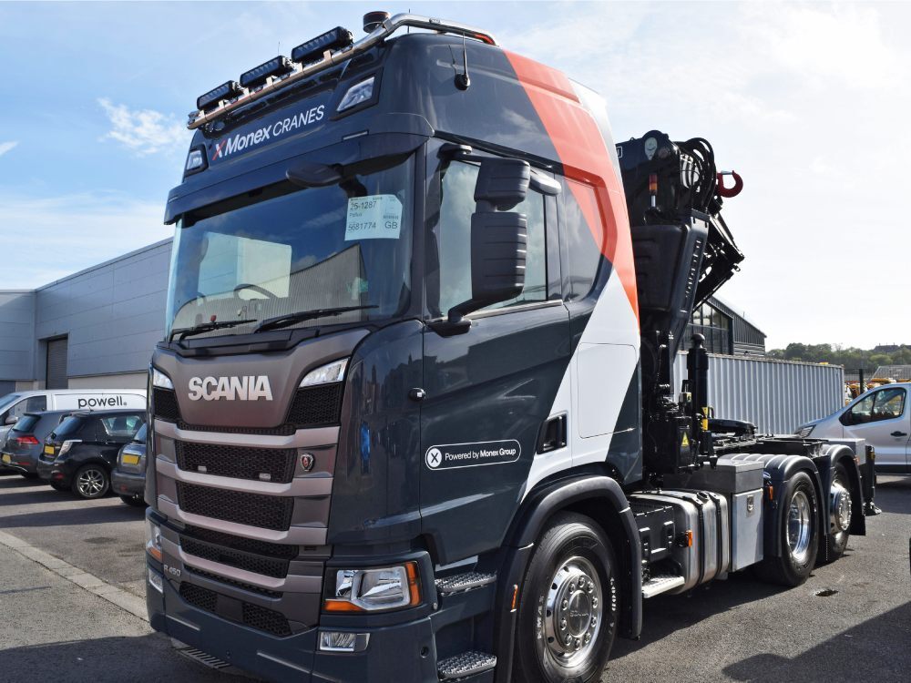 Scania lorry cab with newly installed vehicle wrap and vinyl graphics.
