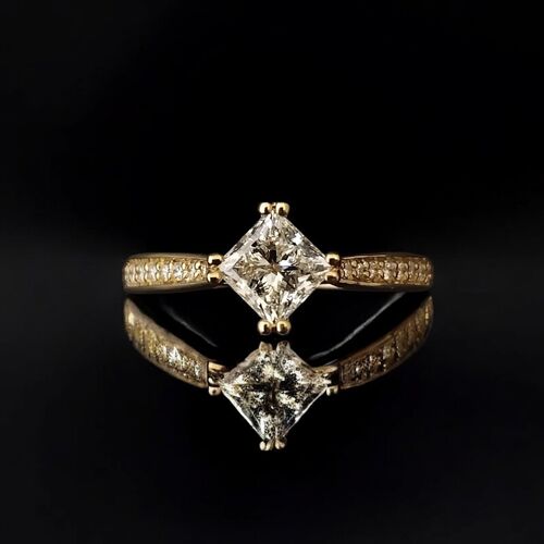 Princess cut double claw solitaire with diamond set shoulders 