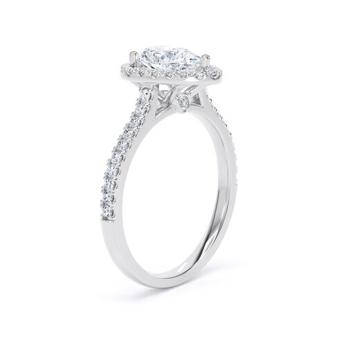 Pear shape halo with diamond set shoulders and hidden diamond detail