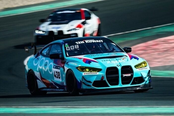 BMW M4 GT4 with motorsport livery on race track