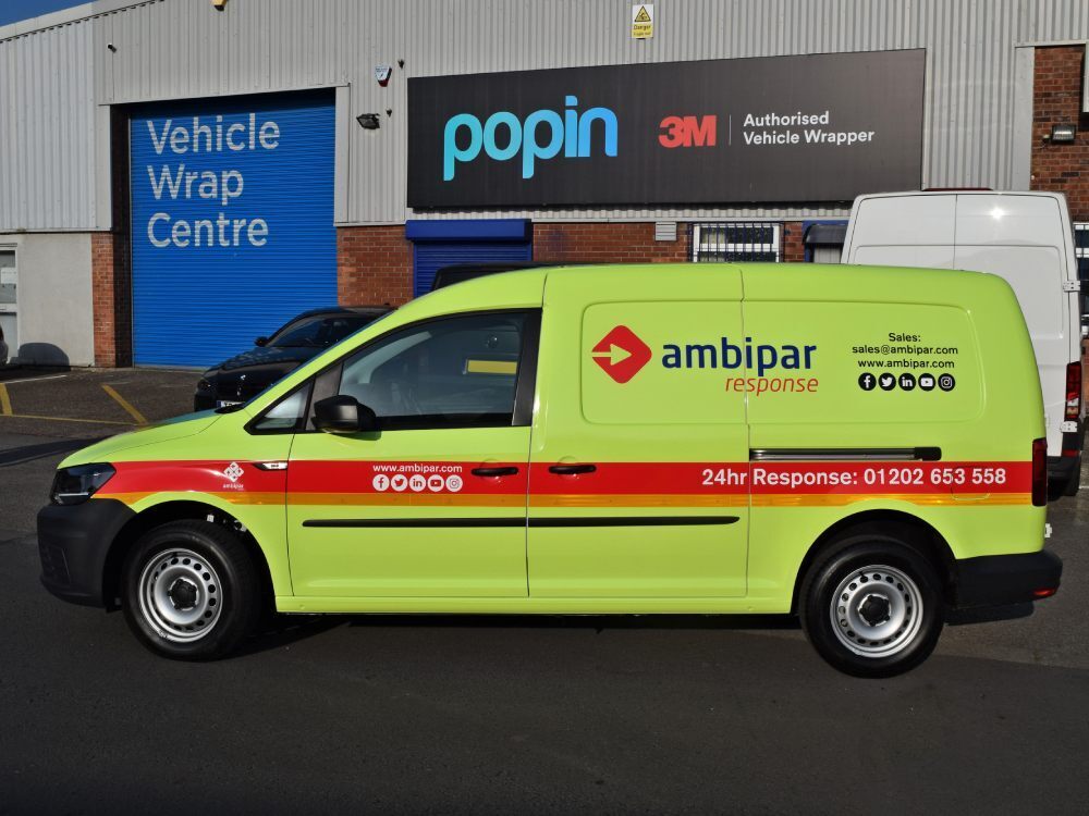 Yellow Ambipar Response van wrap on Volkswagen Caddy Maxi outside Popin in Cardiff.