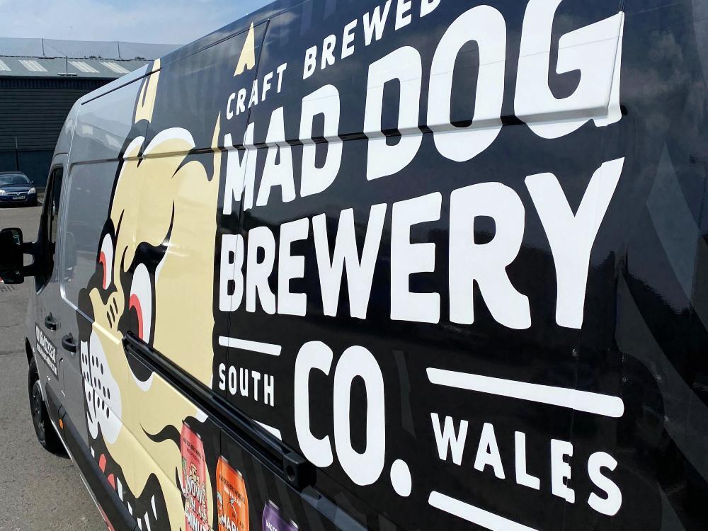 Close up detail of Mad Dog Brewery van wrap on Vauxhall Movano.