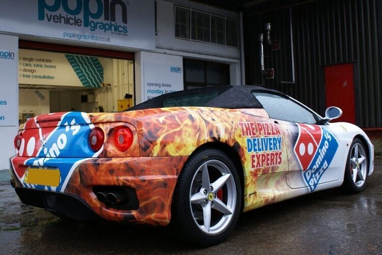 Domino's Pizza commercial car wrap on a Ferrari 360 Spider outside Popin in Cardiff.