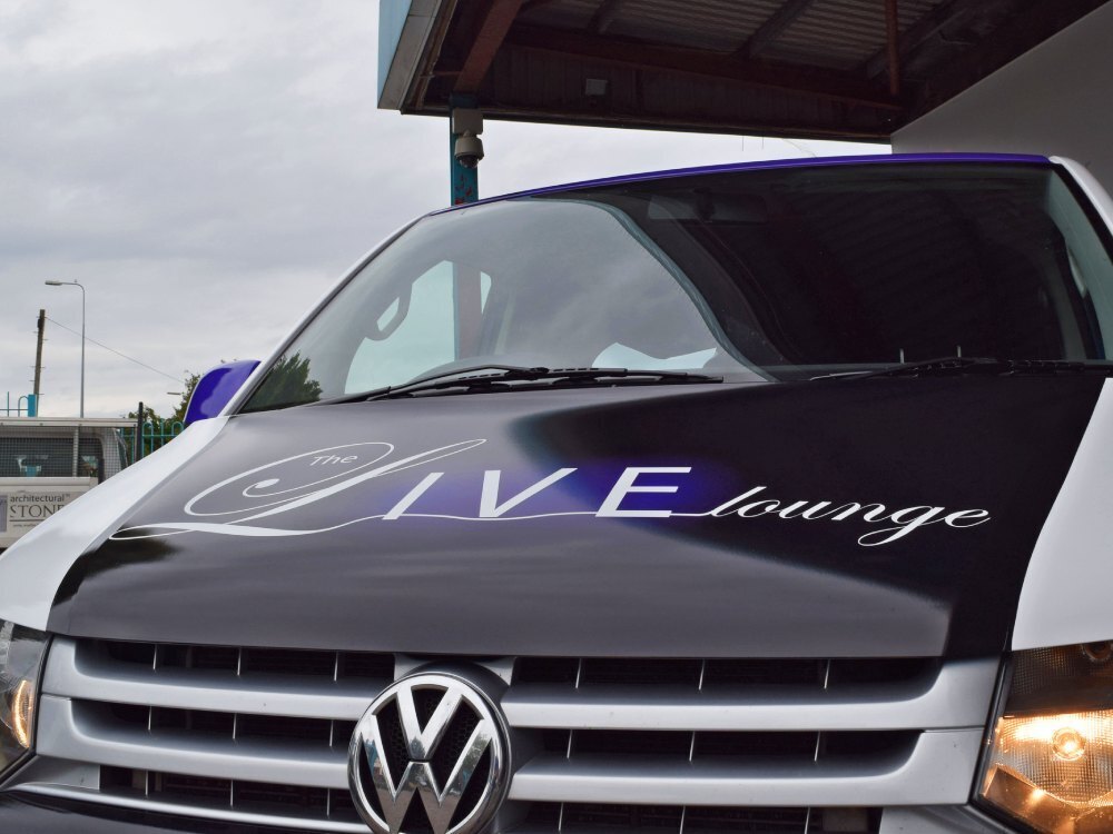 Live Lounge van wrap on bonnet of Volkswagen Transporter.